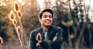 people man guy smile happy travel outdoor trees plant sunrise morning bokeh blur